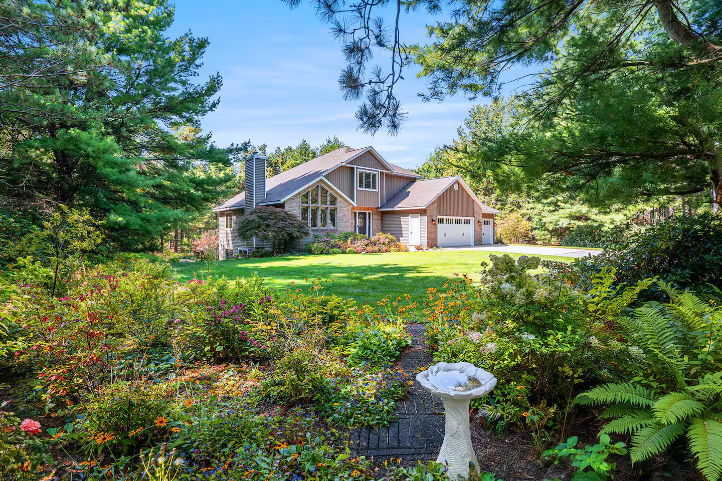 The wooded West Olive cottage where the guest tablet began